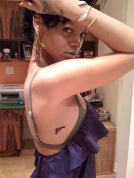 rihanna tattoos gun. Gun Tattoo she got.